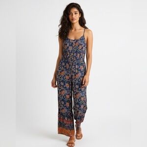 Angie Floral Print Jumpsuit Size Medium Pre Loved Size Medium.